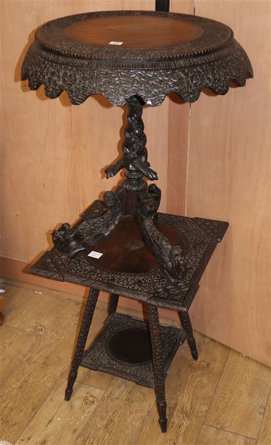 A 19th century Indian carved wood tripod table, Diam.64cm H.70cm and a similar square top two tier table